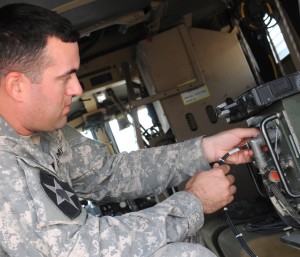 An Army electronic warfare officer at work (Credit: U.S. Army)